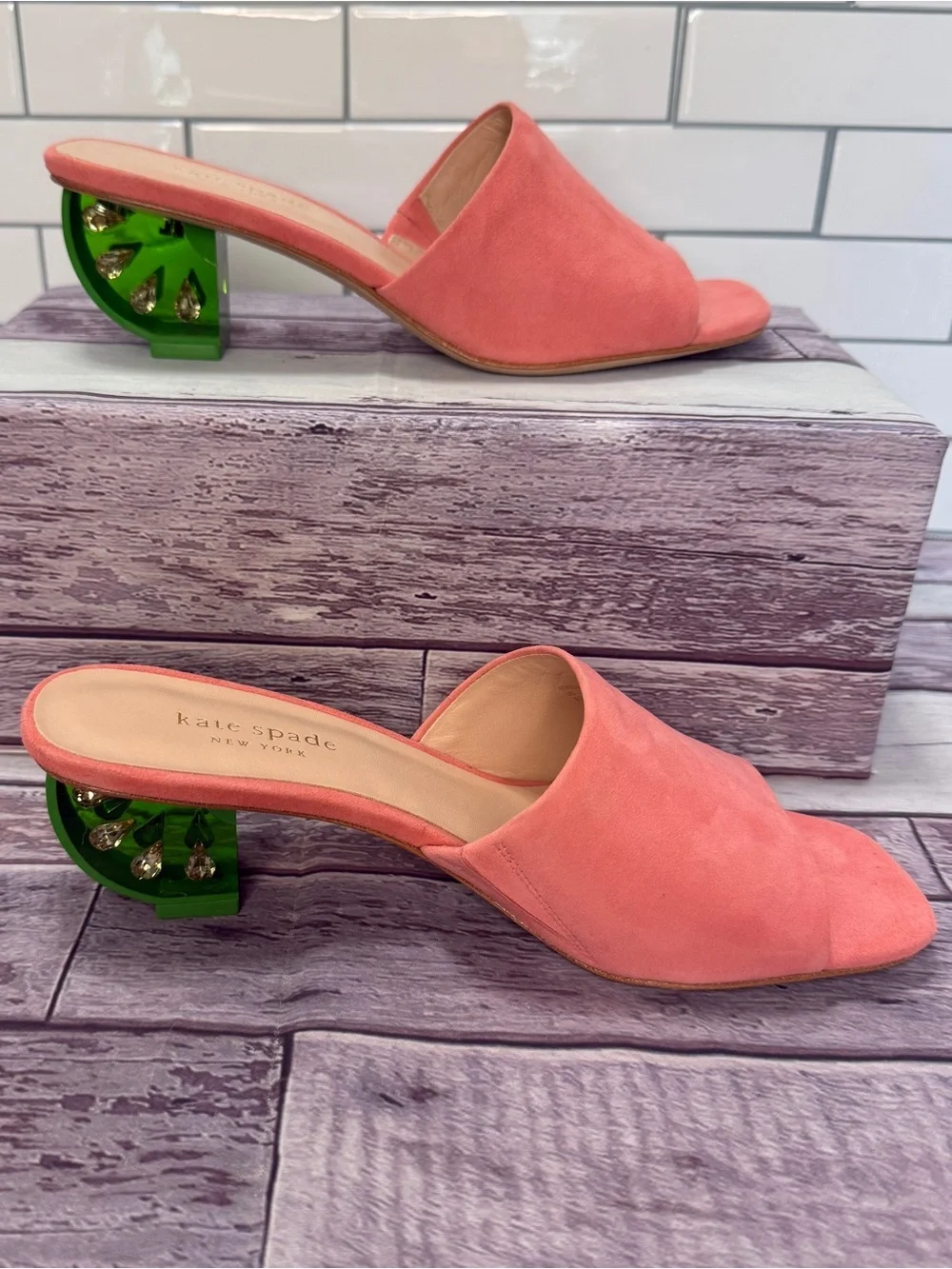 Kate Spade Citrus Slide Sandals in vibrant coral suede with crystal lime heel.